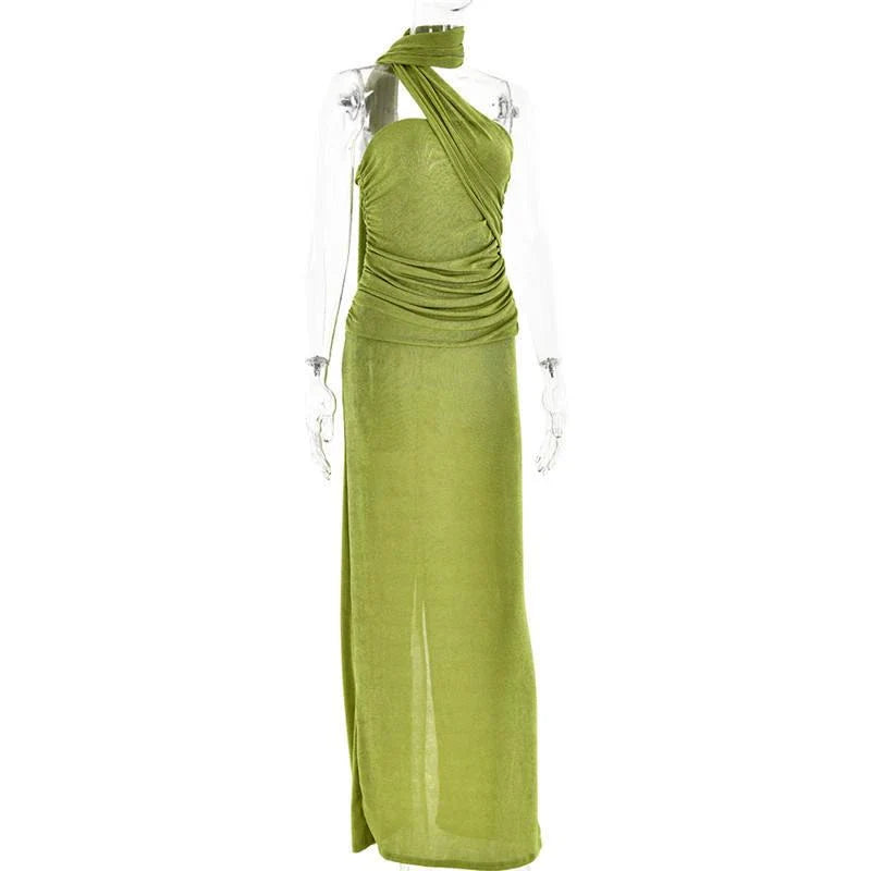 Elegant halter backless ankle-length bodycon dress in a solid colour, designed to flatter the figure and create a sophisticated, eye-catching look for formal events.