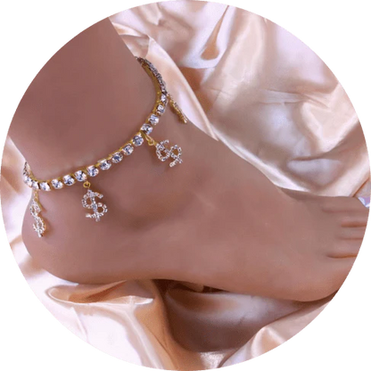 Sparkling gold-colored brass anklet adorned with dollar charms and rhinestones