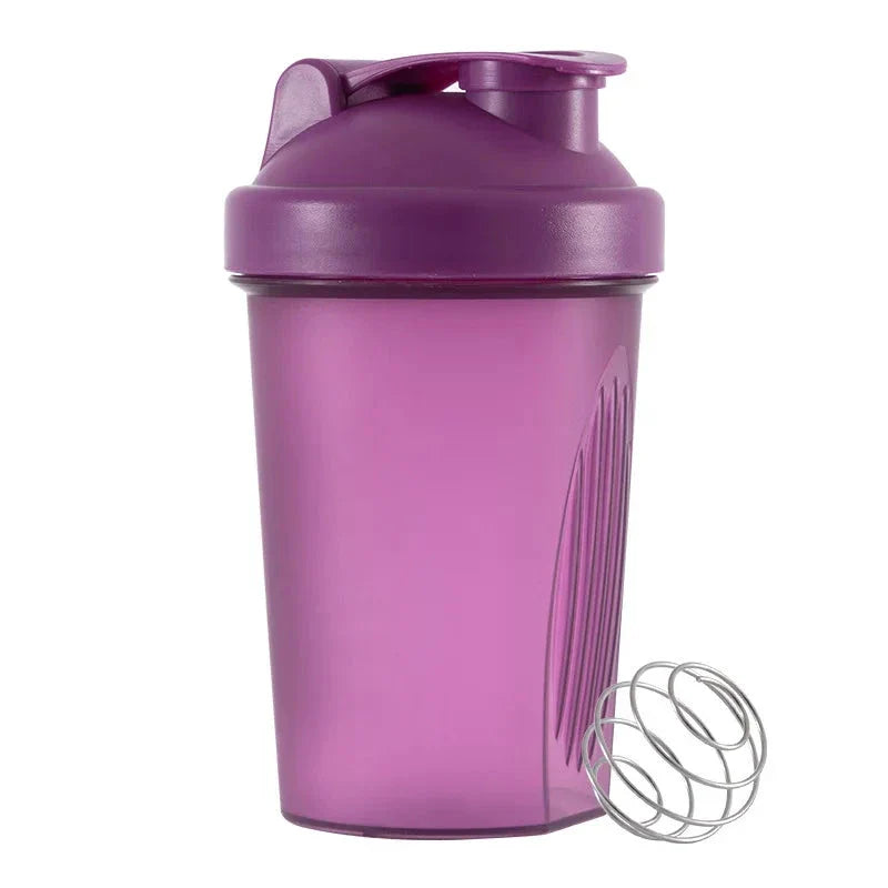 Premium protein shaker bottle with stainless steel whisk ball, BPA-free plastic, and leak-proof design for on-the-go fitness enthusiasts in the UK.