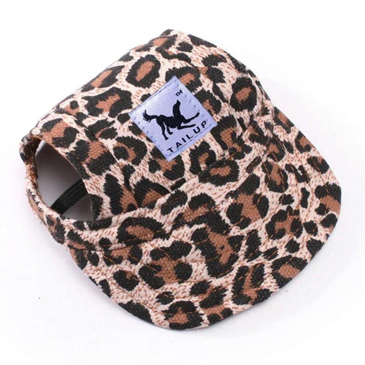 A stylish canvas pet cap with vibrant animal-themed prints, designed for comfort and fashion-forward canine companions.
