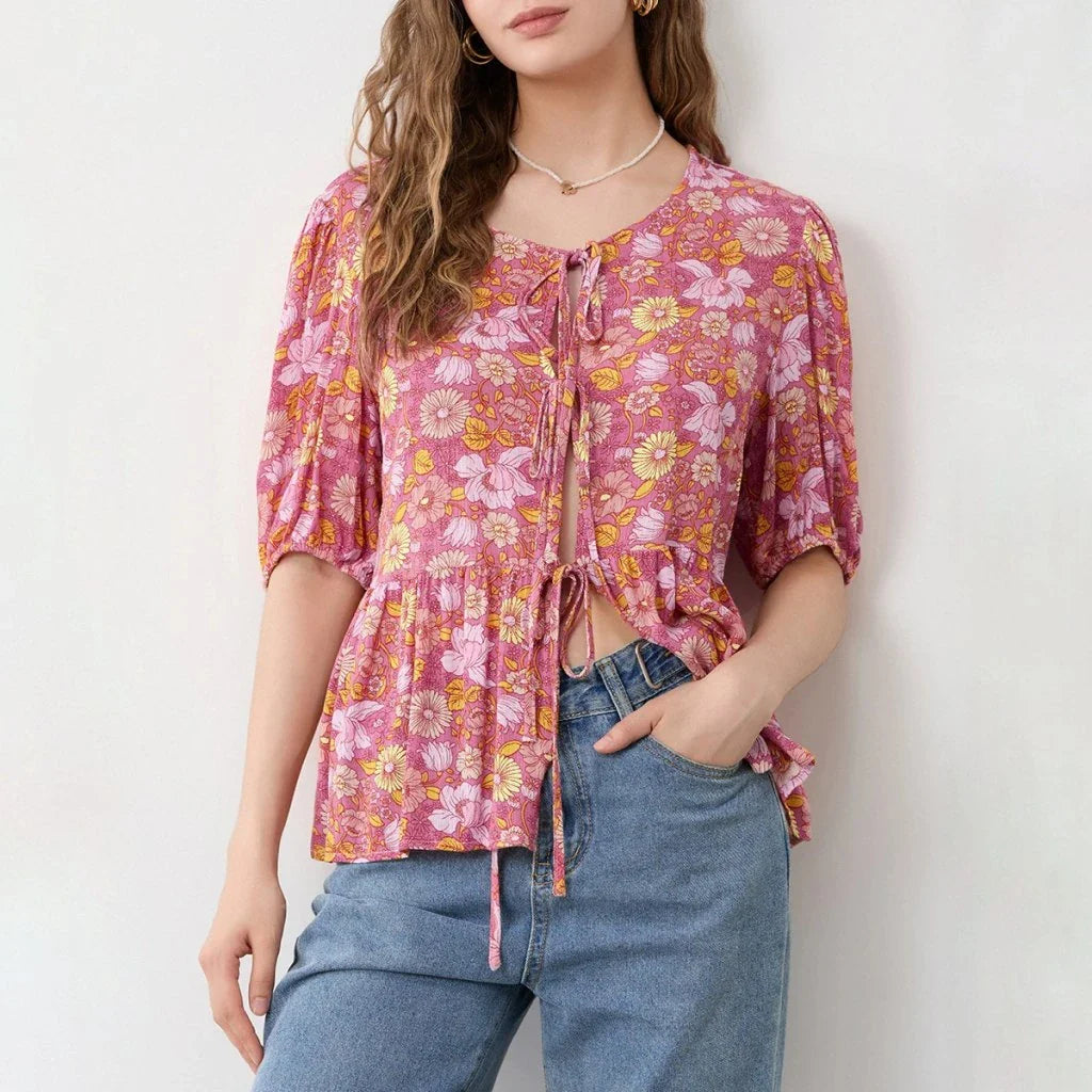 Elegant floral lace blouse with bow v-neck, showcasing vintage charm and modern comfort