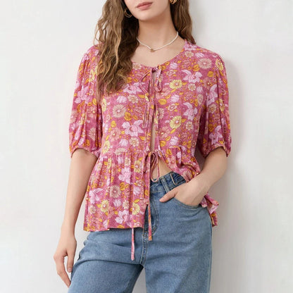 Elegant floral lace blouse with bow v-neck, showcasing vintage charm and modern comfort