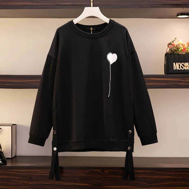 A premium ladies' round neck pullover in a versatile black colour, made from high-quality cotton for exceptional softness and comfort.