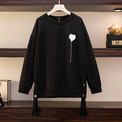 A premium ladies' round neck pullover in a versatile black colour, made from high-quality cotton for exceptional softness and comfort.