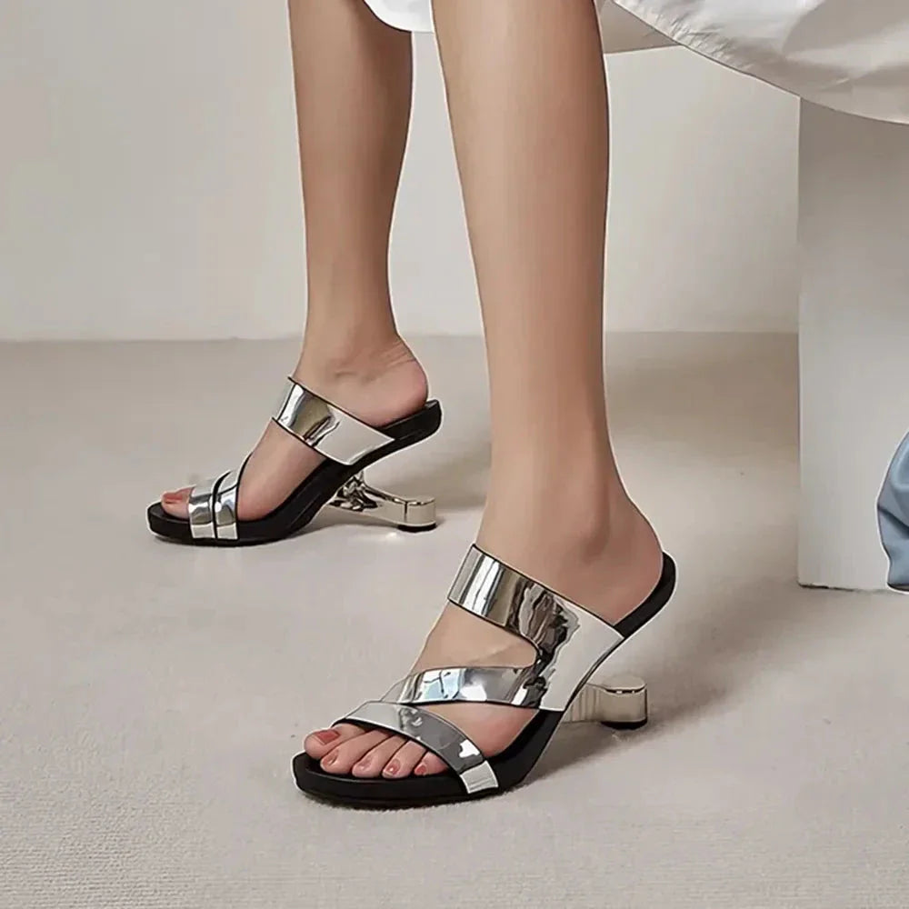 Genuine leather high heel slides with a unique and distinctive design, perfect for summer fashion and comfort.