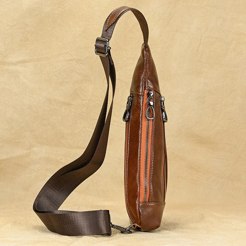 Premium genuine leather chest bag with vintage European and American design elements, perfect for the modern British gentleman.