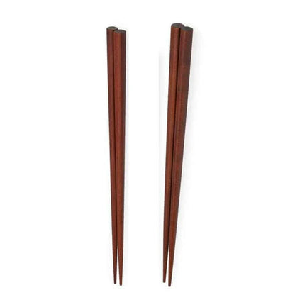 A set of four high-quality wooden chopsticks in a sleek, Japanese-inspired design