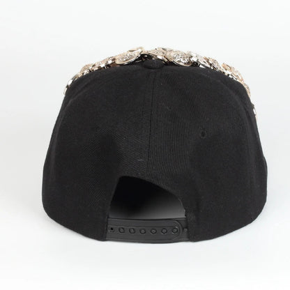 A black baseball cap with a striking skull and leopard print design, featuring adjustable snapback closure for a customized fit.