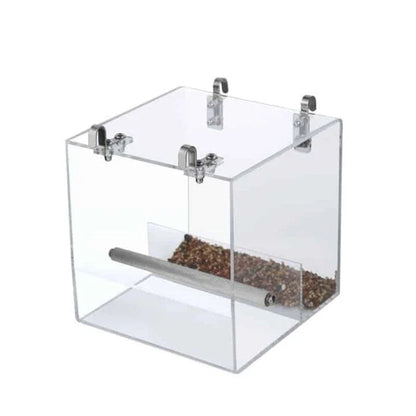 A transparent acrylic bird feeder cube with a sleek and modern design, perfect for adding a touch of elegance to your garden or balcony.