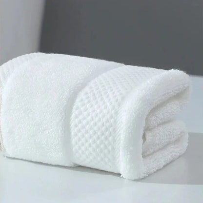 Premium 100% cotton face towel in blue, featuring a soft and absorbent design for daily facial cleansing and bathing