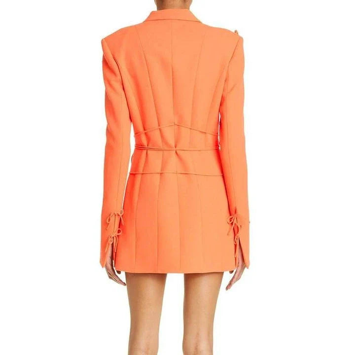 A sophisticated notched collar blazer with an elegant bow detail, perfect for professional and casual wear.