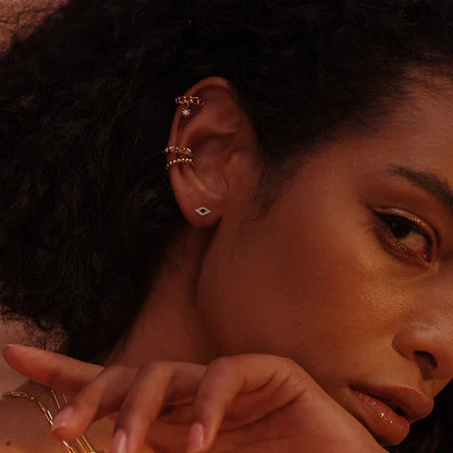 Luxurious gold and dark blue eye earrings with premium 14K gold-plated copper construction for sophisticated style