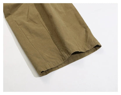Sophisticated men's casual trousers in various colours, featuring a tailored straight-leg design and mid-rise waistline for a polished, British-inspired look.