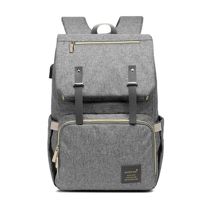 A stylish and practical mummy backpack with multiple pockets, perfect for organising and transporting all your parenting essentials.