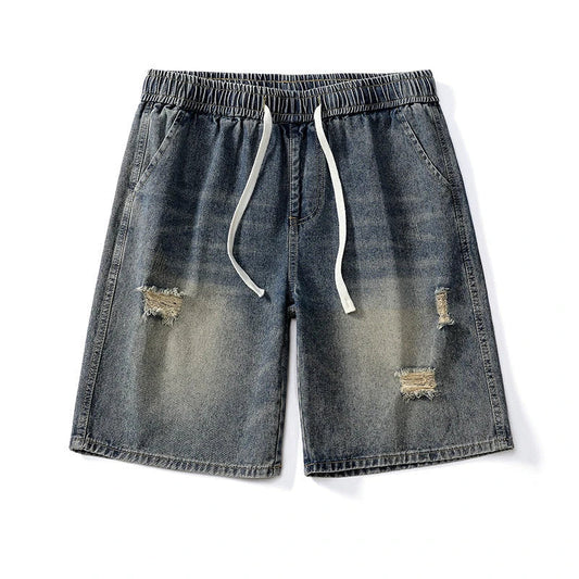 Premium British-crafted vintage-inspired ripped denim shorts for men with a straight-leg silhouette and authentic distressed details