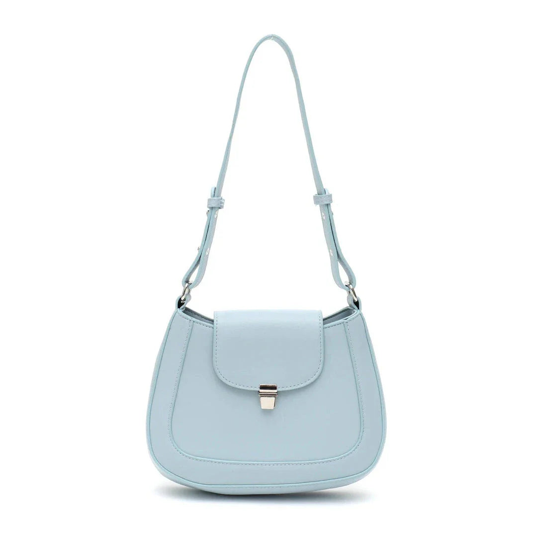 Elegant and versatile vegan leather shoulder bag with adjustable strap, flap cover, and interior pockets for modern British women