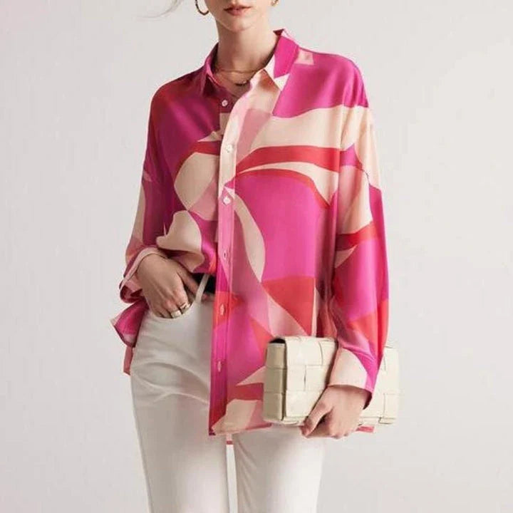 Elegant silk crepe de chine blouse in a unique print design, featuring a loose, straight fit and classic collar for a sophisticated yet comfortable look.