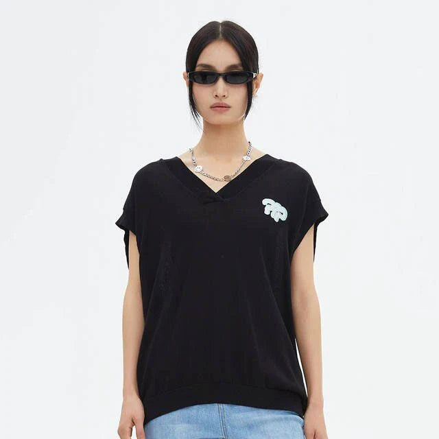 Elegant V-Neck Knit Vest for Stylish British Women - A premium knit vest with a classic design, tailored to flatter the middle-aged woman's figure.