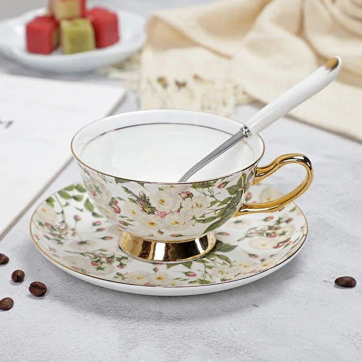 Charming floral porcelain tea set with cup, saucer, and spoon in a variety of delicate colour options