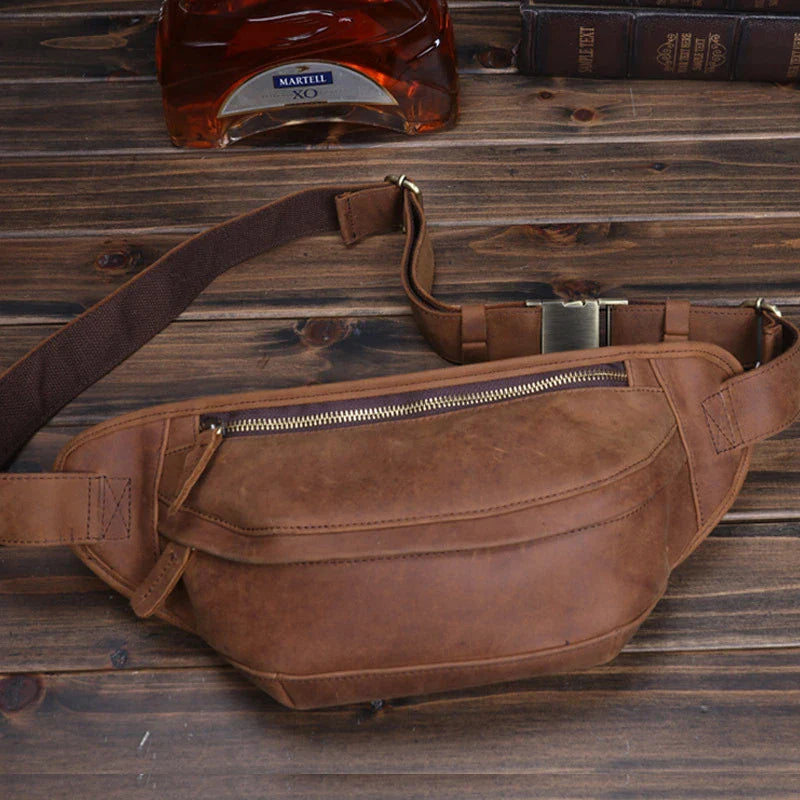 Premium British leather crossbody bag with adjustable strap and multiple pockets for organised storage