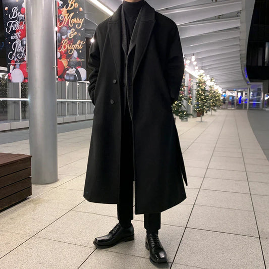 Premium British knee-length trench coat in classic black, featuring a relaxed, comfortable fit and made from a durable polyester-viscose blend.