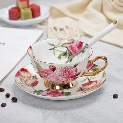 Charming floral porcelain tea set with cup, saucer, and spoon in a variety of delicate colour options
