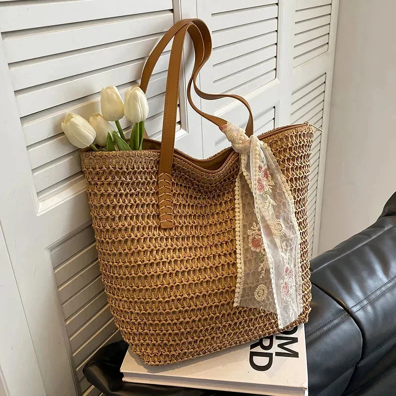 Elegant handcrafted woven straw tote bag in beige colour, perfect for summer outings and carrying essentials