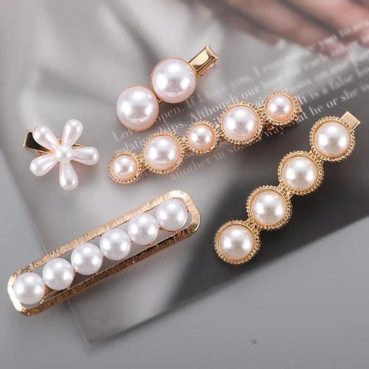 Elegant silver-toned hair clip with a beautiful pearl flower design, a timeless British-inspired accessory