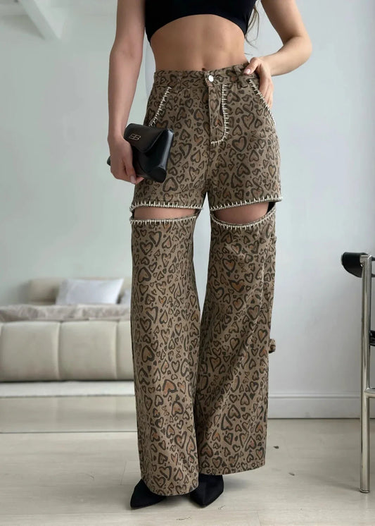 Stylish leopard print wide-leg jeans with patchwork design, perfect for fashion-forward women in the UK