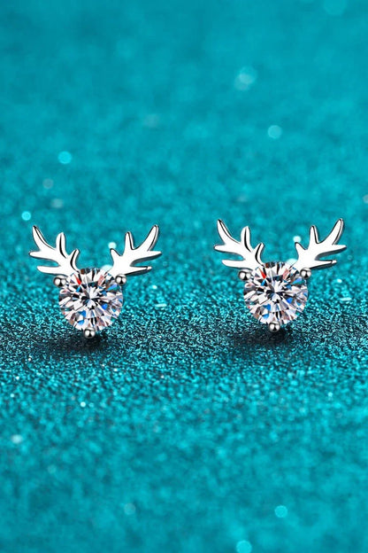 Elegant sterling silver ring featuring a reindeer-shaped moissanite centre stone with a polished finish