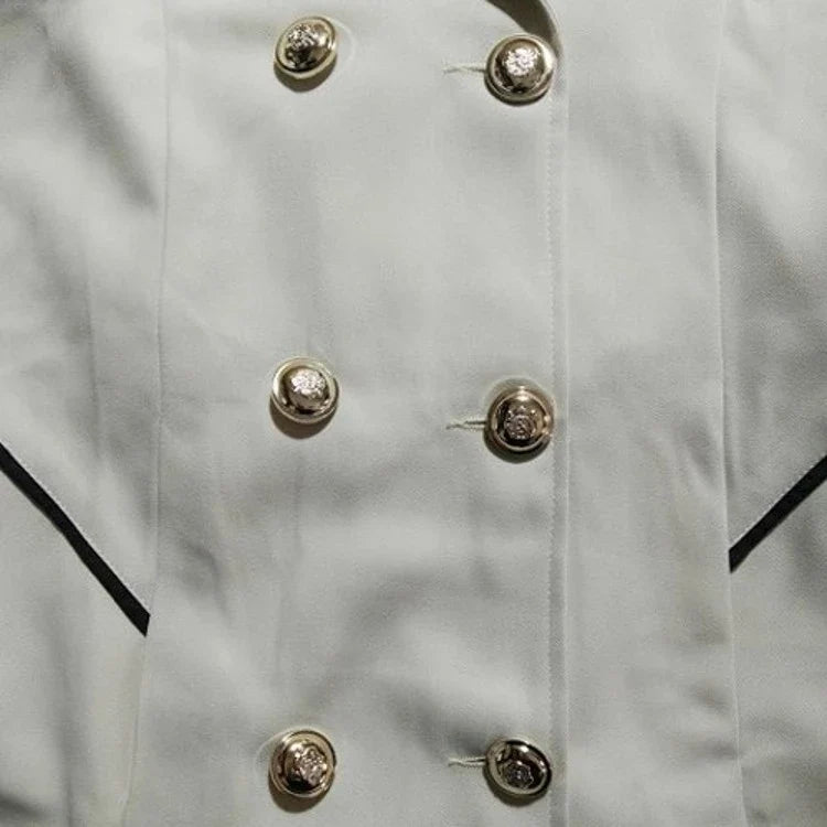 Sleek and sophisticated medium-length commuter coat in black, beige, and blue colours for British professionals