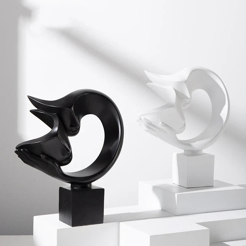 Elegant minimalist resin bogu wall shelf in white and black colours, with decorative items displayed on the shelf