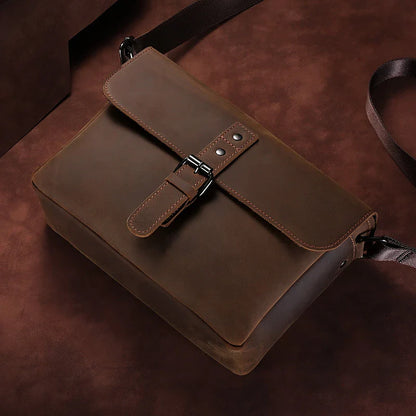 Premium quality large capacity shoulder bag in sleek black colour with latch closure and interior pockets, perfect for modern British lifestyle