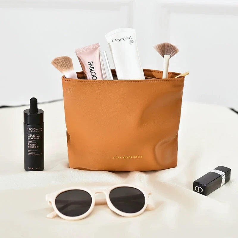 A versatile PU leather organiser bag in white and brown colours, designed to keep your daily essentials organised and your travels stylish.