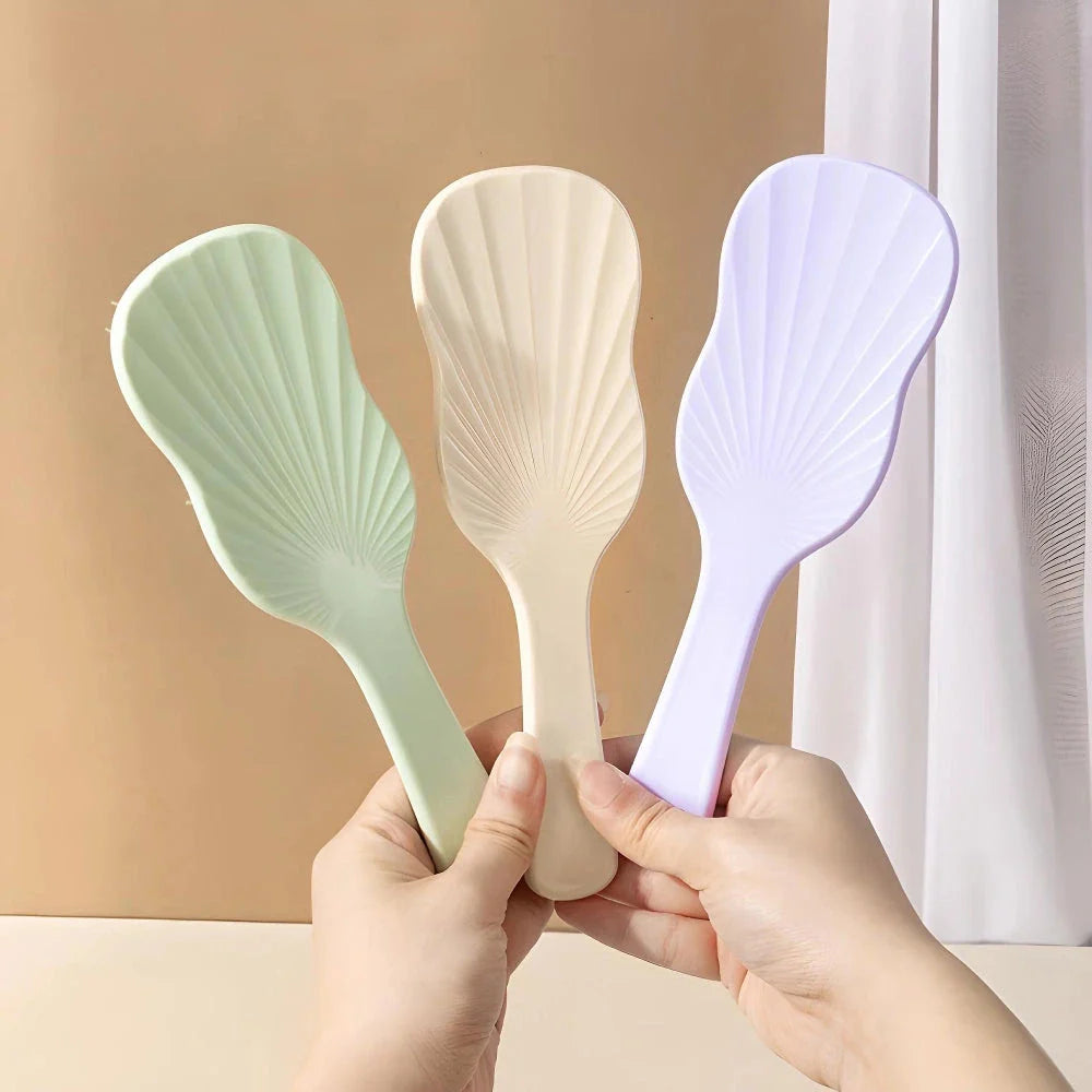 Salon-quality hair straightening comb with air cushion for soothing scalp massage, available in vibrant colours