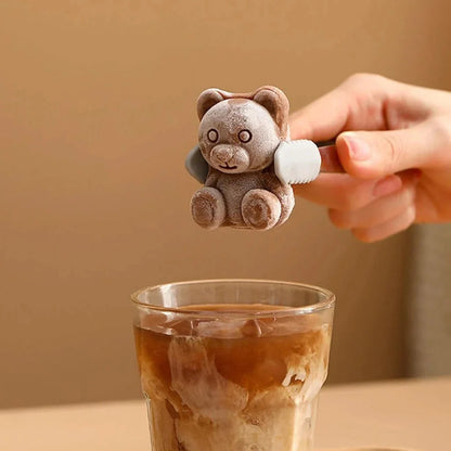 Yellow silicone bear-shaped ice cube mould for creating fun and creative frozen treats