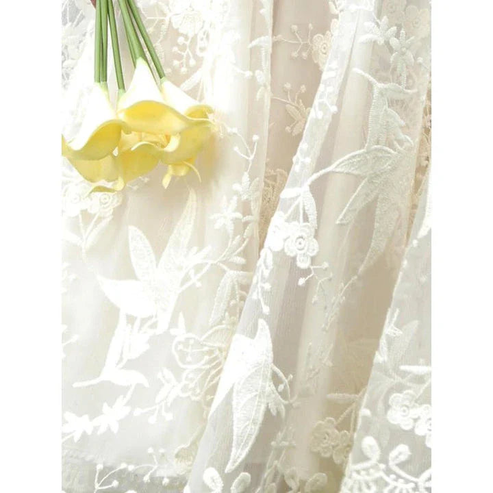 Elegant floral lace A-line skirt in apricot colour, featuring a flattering silhouette and intricate embroidery