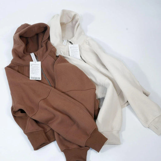 Premium women's sports fleece hoodie with half zip, available in a range of sophisticated colours