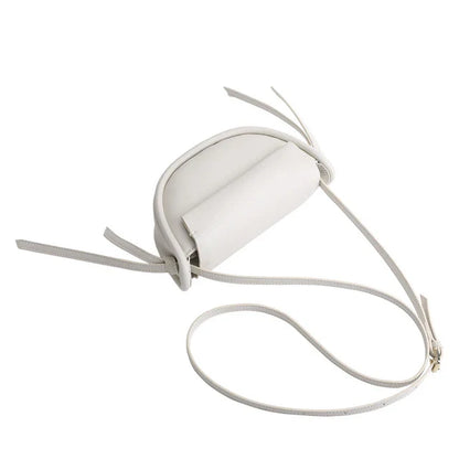 Premium cowhide leather crossbody bag in a distinctive semicircle shape, available in classic colours to complement any UK wardrobe