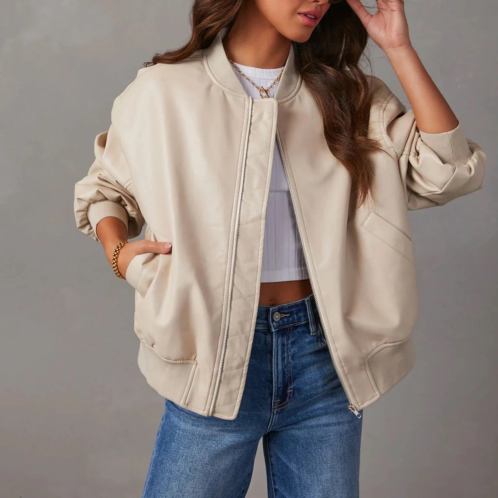 Stylish leather baseball jacket with Peter Pan collar, perfect for casual British streetwear