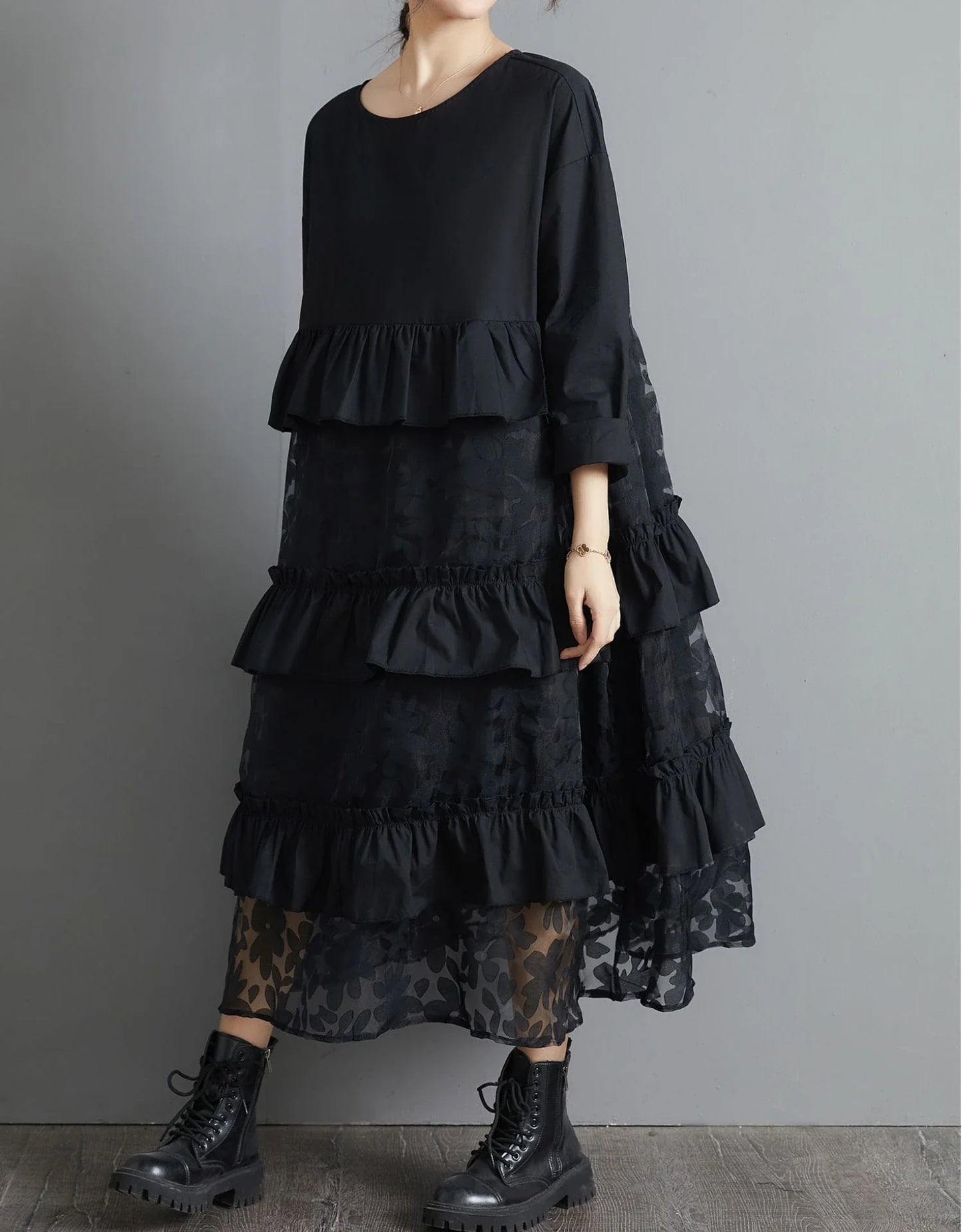 Plus size black lace dress with long sleeves and a loose, relaxed fit for a timeless and sophisticated look