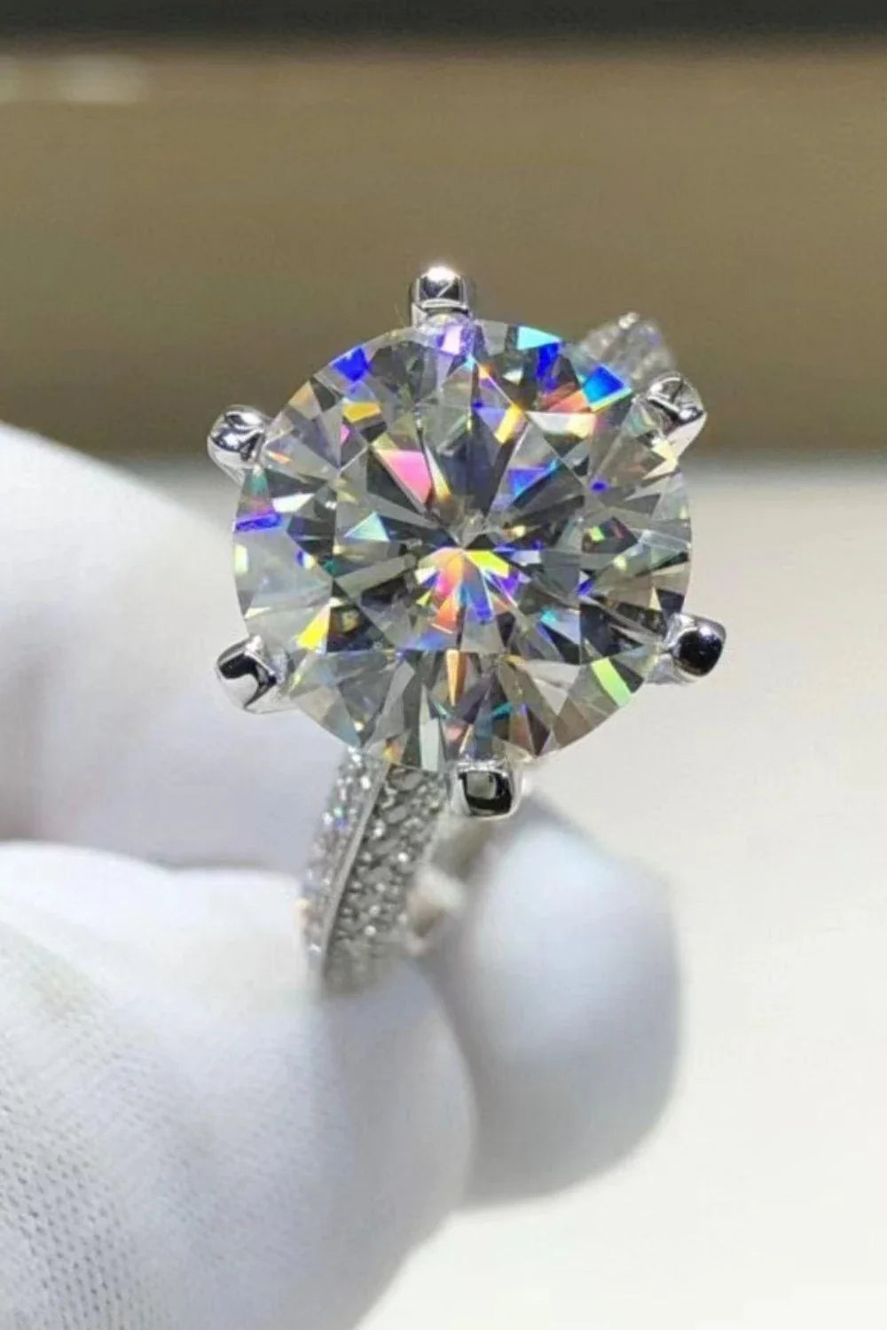 Elegant 5 carat moissanite solitaire ring in 925 sterling silver with platinum plating and sparkling zircon accents