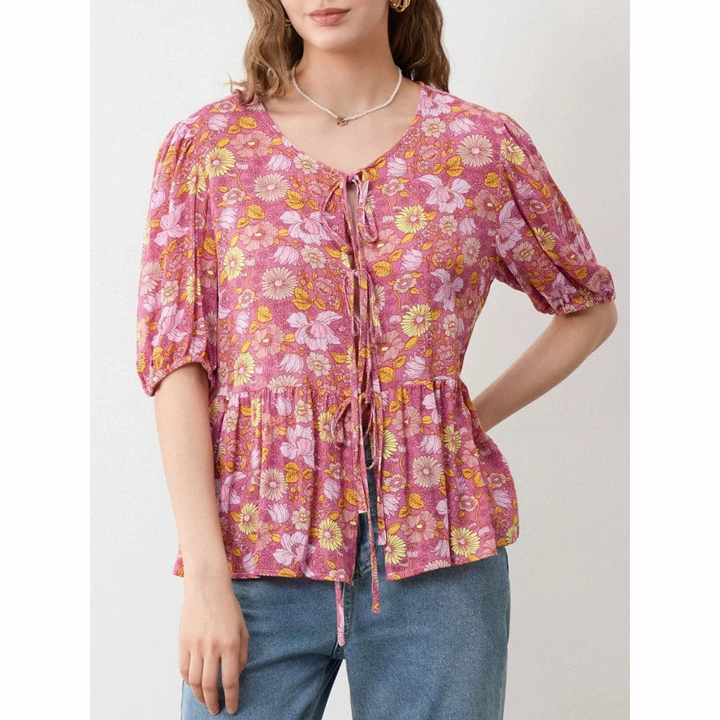 Elegant floral lace blouse with bow v-neck, showcasing vintage charm and modern comfort