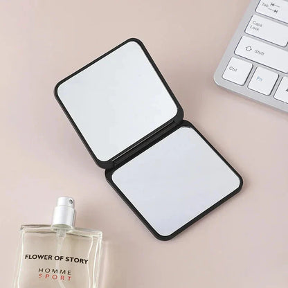 Portable Folding Double-Sided Makeup Mirror in Blue, Pink, Black, and Silver Colours