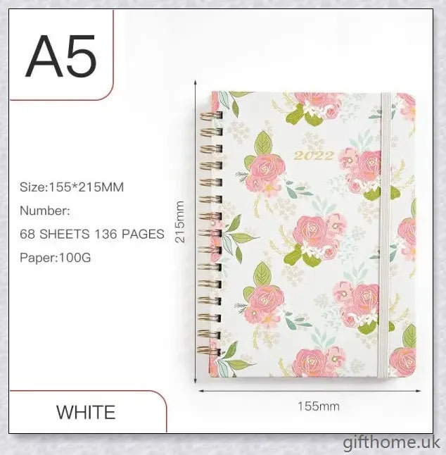 Premium A5 spiral-bound annual calendar notebook with a variety of stylish cover designs including blue art, pink roses, and colourful floral patterns