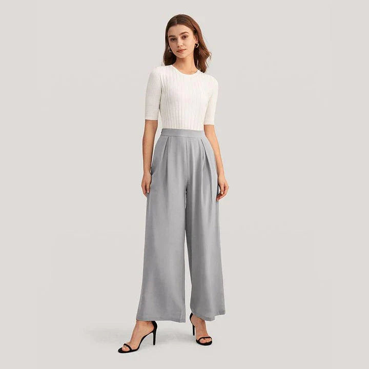 Exquisite grey silk wide-leg trousers with high-waisted design and relaxed fit for sophisticated style