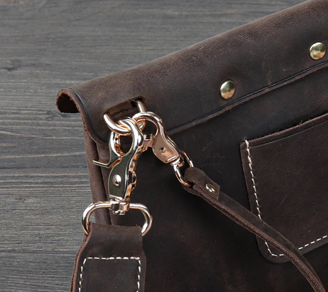 Premium handcrafted leather messenger bag in a classic British design, featuring a sturdy construction and spacious interior for the modern gentleman's everyday essentials.