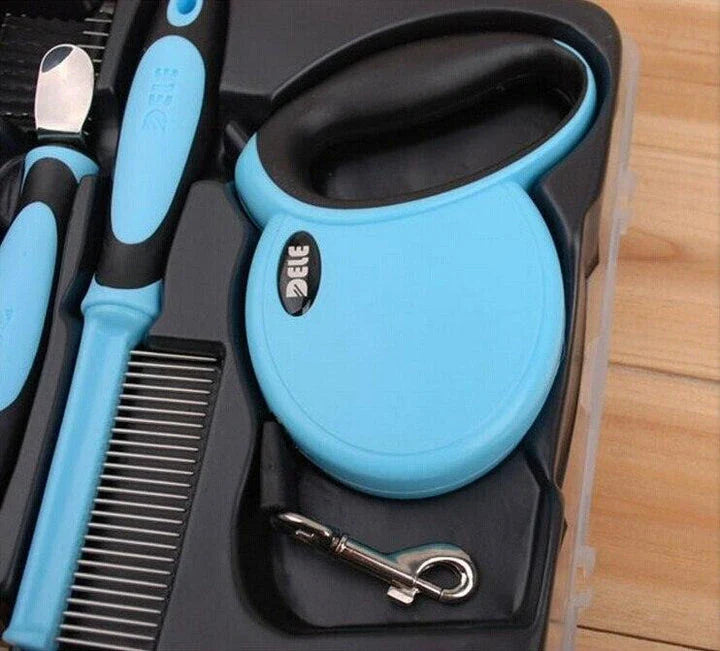 Premium UK pet grooming tool set with nail clippers, slicker brush, steel pin comb, deshedding tool, and retractable leash