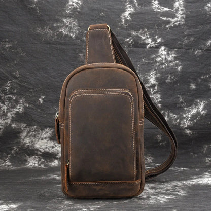 Vintage-inspired genuine leather briefcase with multiple compartments and secure zipper closure, ideal for modern commuters