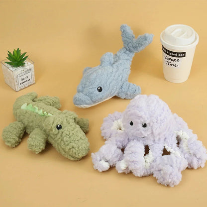 Plush crocodile-shaped squeaky dog toy made of durable, bite-resistant fleece material